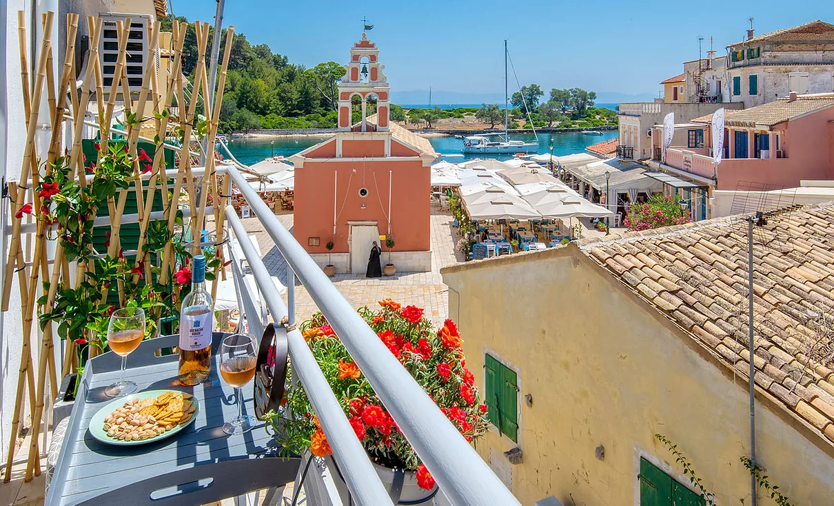 Balcony overlooking the sea and Paxos island main village